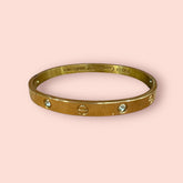 Elegant Gold-Tone Studded Bangle